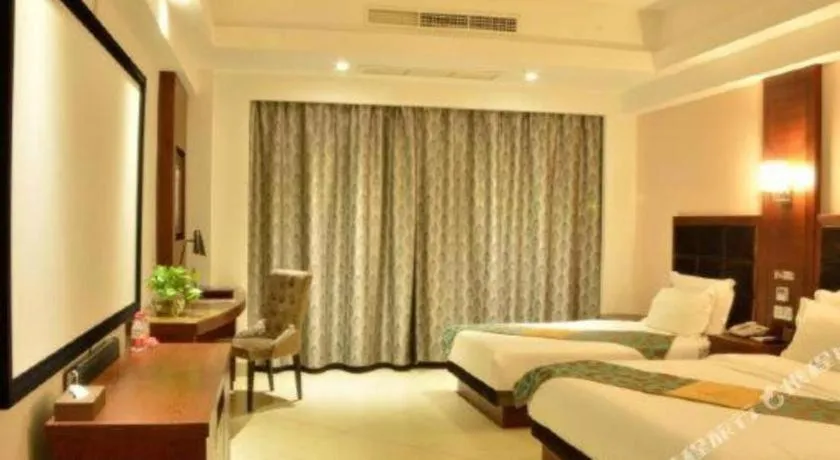 Bed in Qionghai Jin Mao Hotel