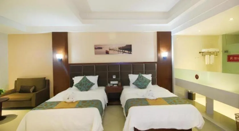 Bed in Qionghai Jin Mao Hotel