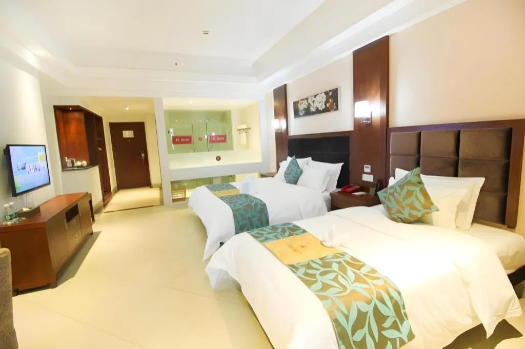 Bed in Qionghai Jin Mao Hotel