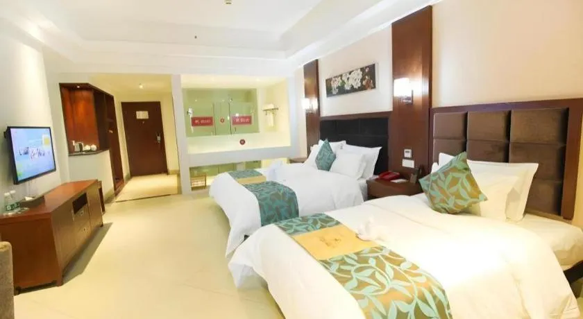 Bed in Qionghai Jin Mao Hotel