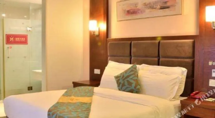 Bed in Qionghai Jin Mao Hotel