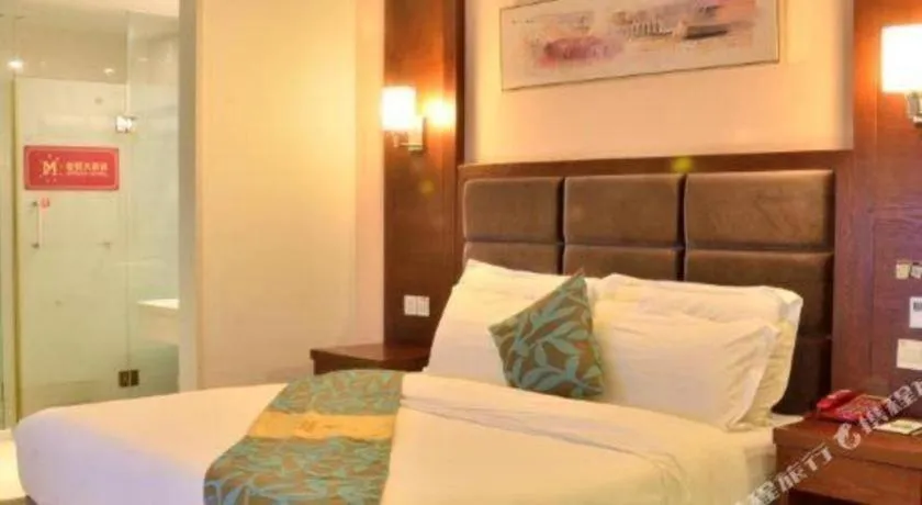 Bed in Qionghai Jin Mao Hotel