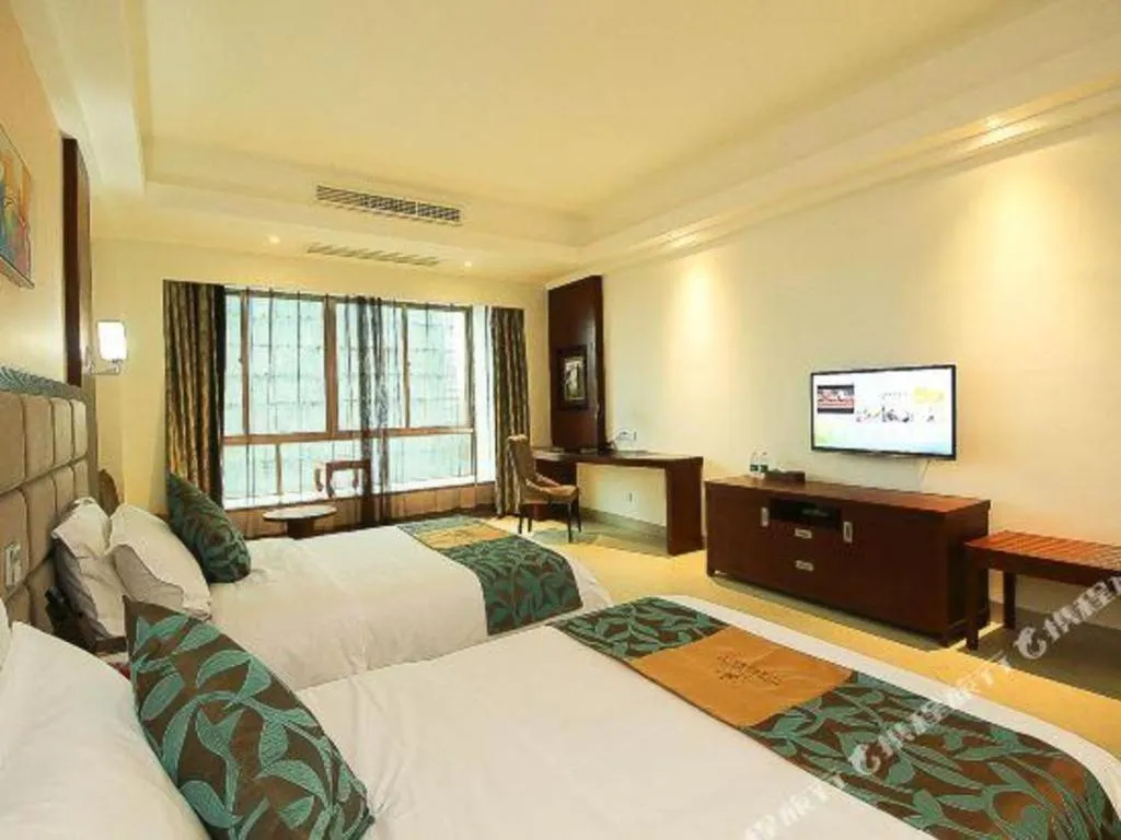 Bed in Qionghai Jin Mao Hotel