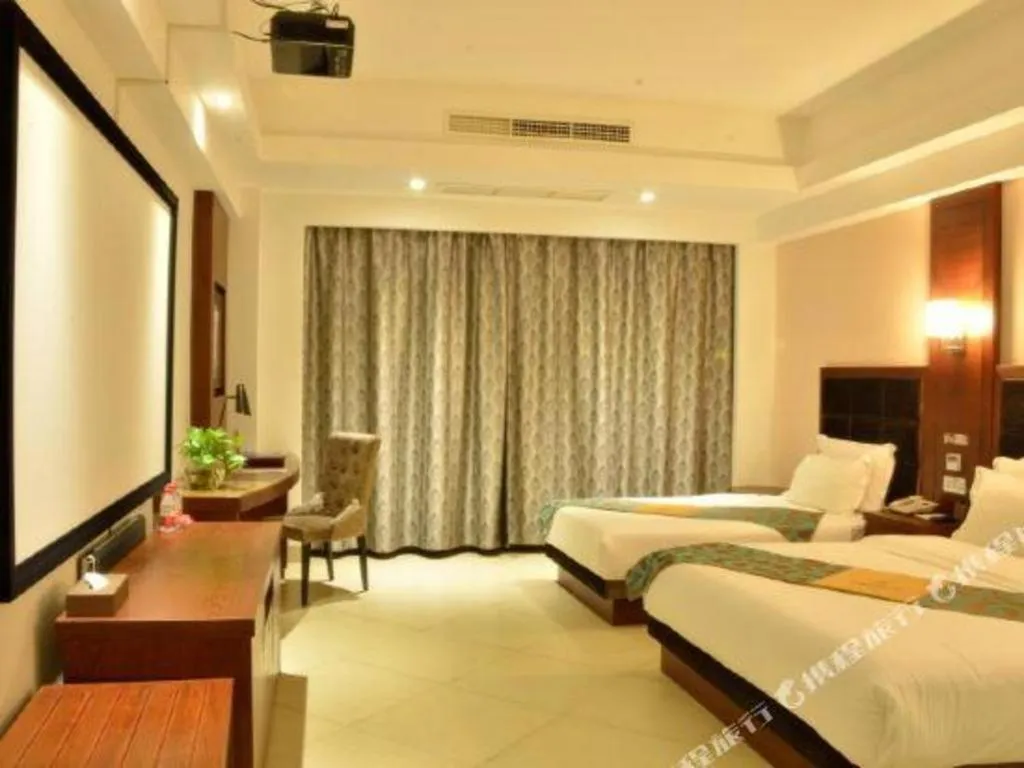 Bed in Qionghai Jin Mao Hotel