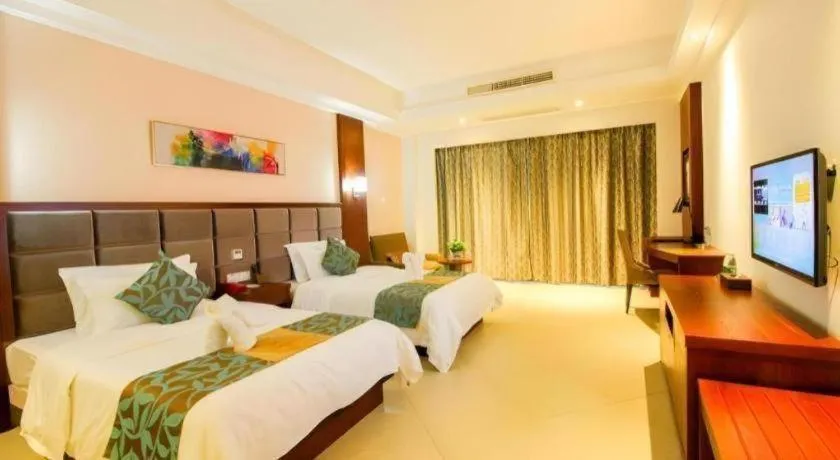 Bed in Qionghai Jin Mao Hotel