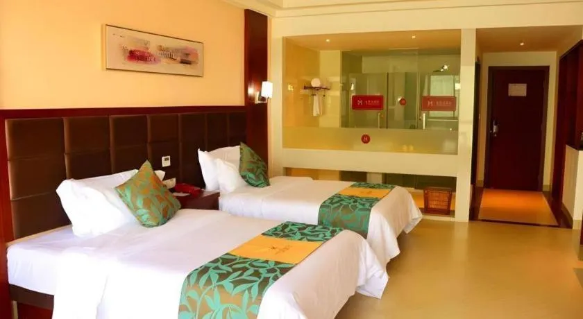 Bed in Qionghai Jin Mao Hotel