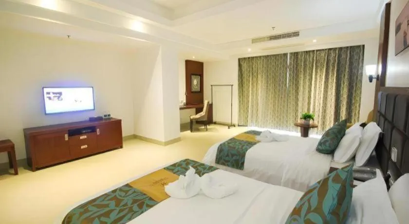 Bed in Qionghai Jin Mao Hotel