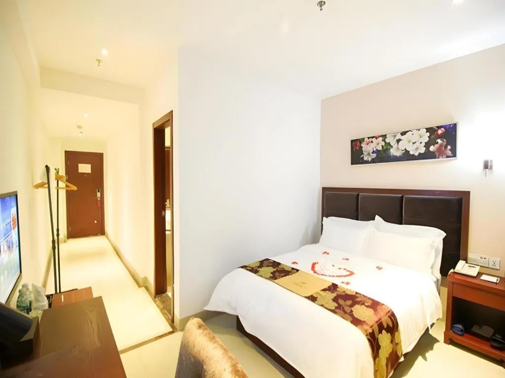 Bed in Qionghai Jin Mao Hotel