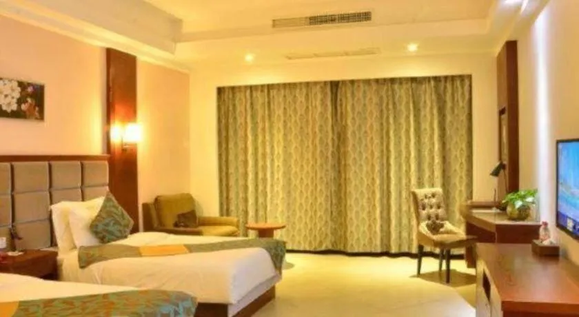 Bed in Qionghai Jin Mao Hotel