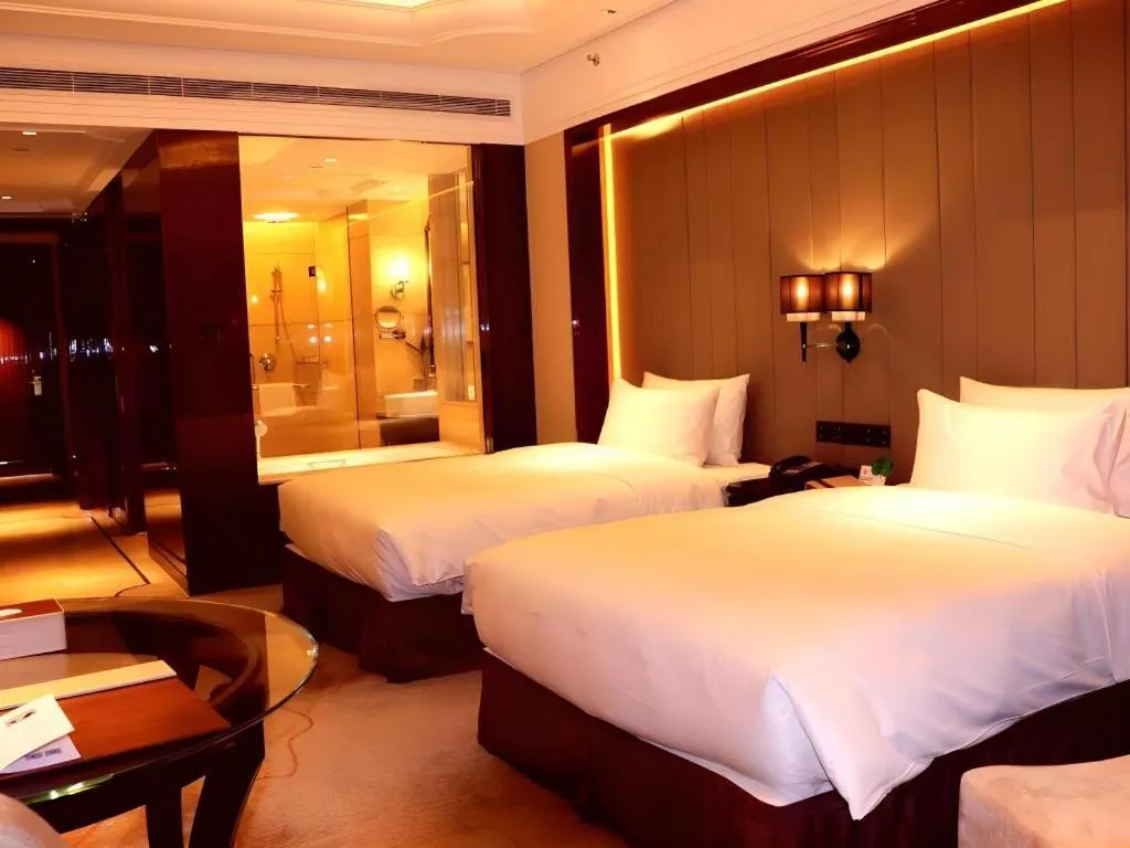 Bed in Wyndham Grand Plaza Royale Xianglin Shaoyang