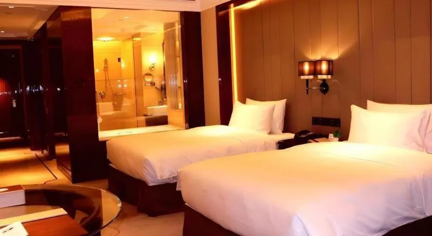 Bed in Wyndham Grand Plaza Royale Xianglin Shaoyang
