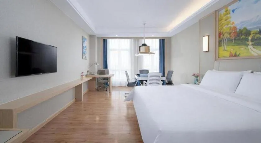 Bed in Vienna Hotel Tianjin Huaming