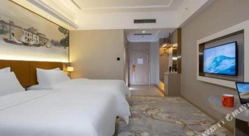 Bed in Vienna Hotel Tianjin Huaming