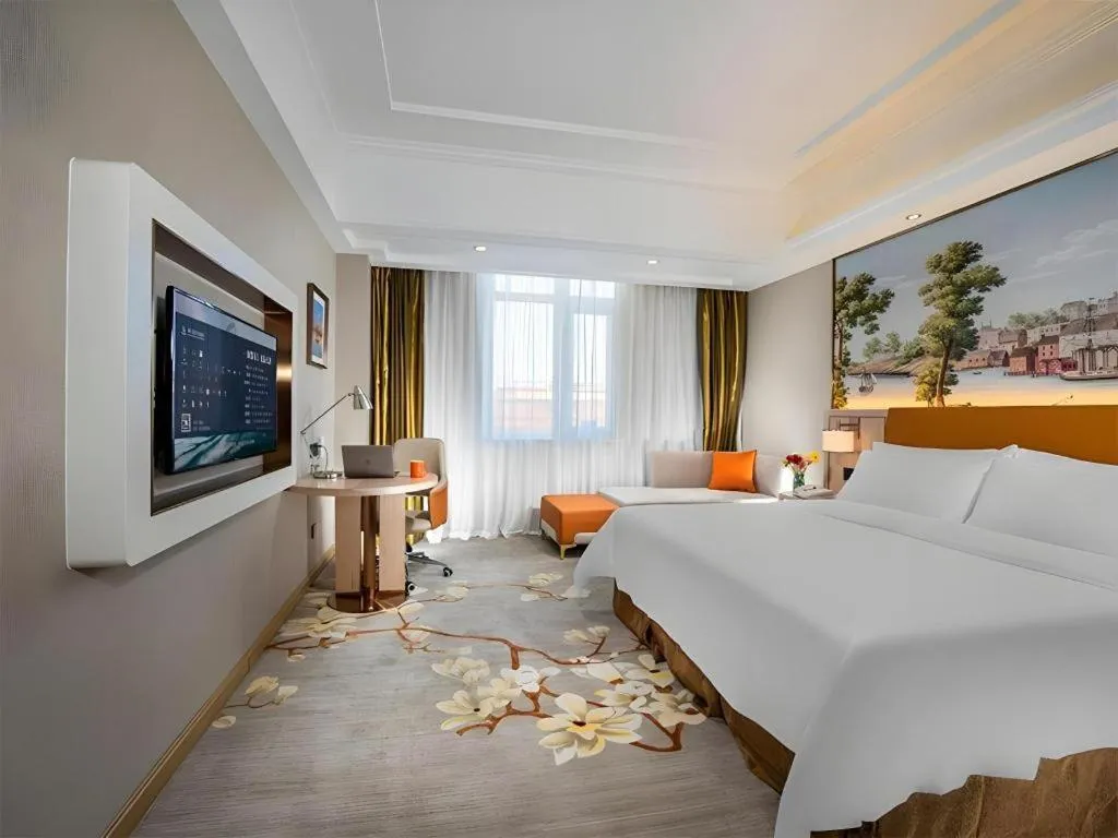 Bed in Vienna Hotel Tianjin Huaming