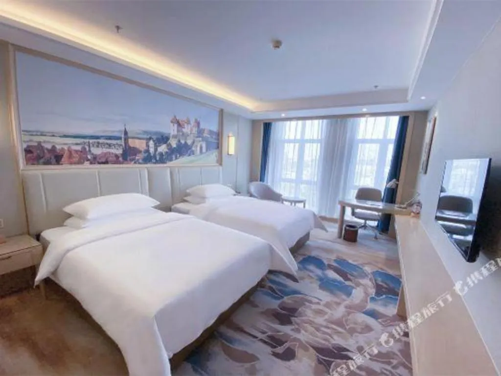 Bed in Vienna Hotel Tianjin Huaming