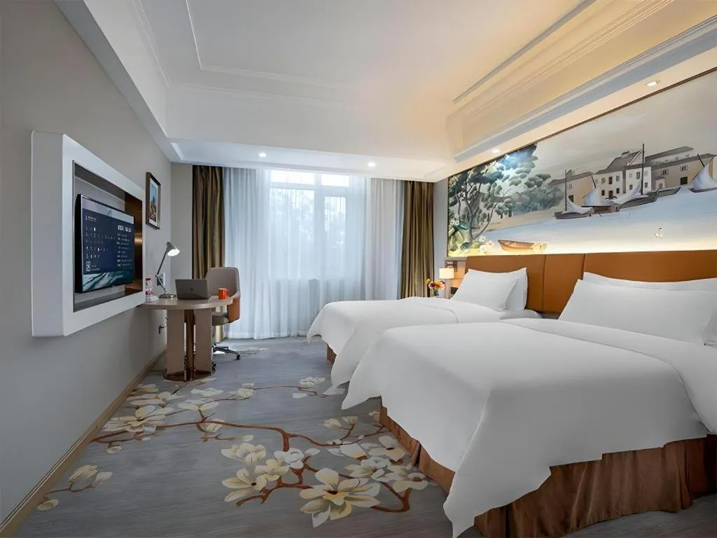 Bed in Vienna Hotel Tianjin Huaming