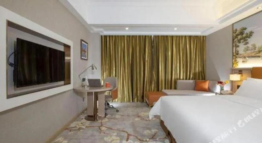 Bed in Vienna Hotel Tianjin Huaming