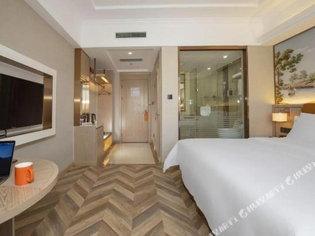 Bed in Vienna Hotel Tianjin Huaming