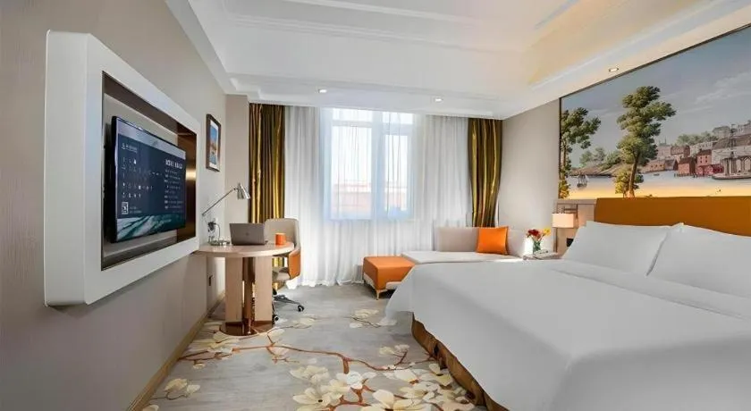 Bed in Vienna Hotel Tianjin Huaming