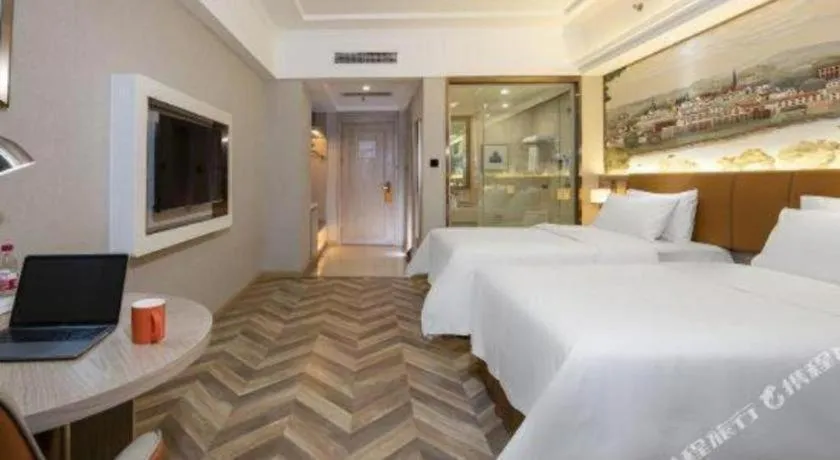 Bed in Vienna Hotel Tianjin Huaming