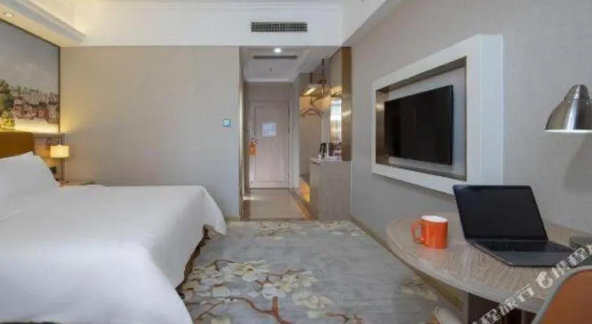 Bed in Vienna Hotel Tianjin Huaming