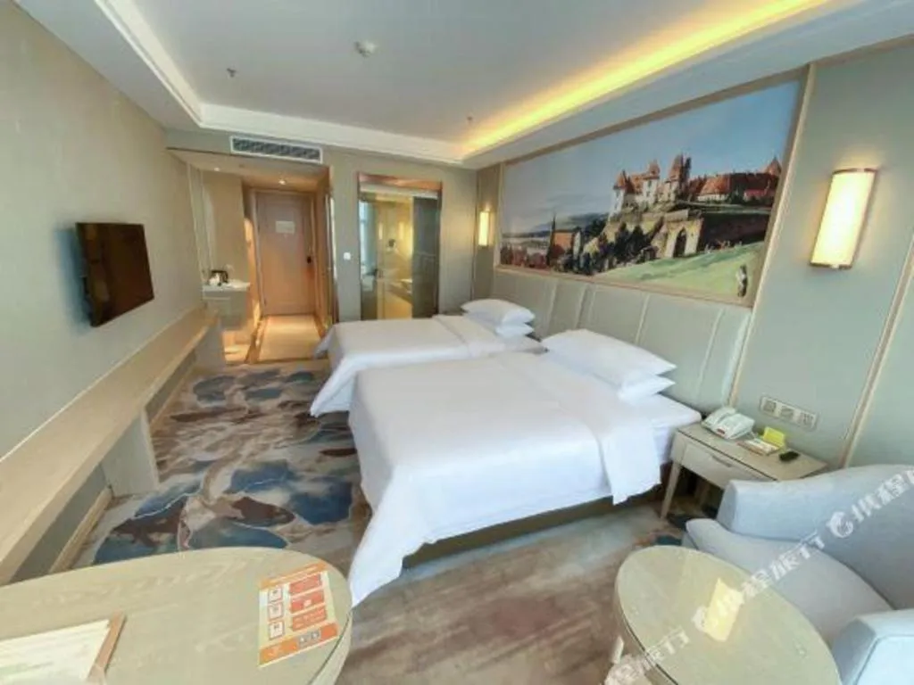 Bed in Vienna Hotel Tianjin Huaming