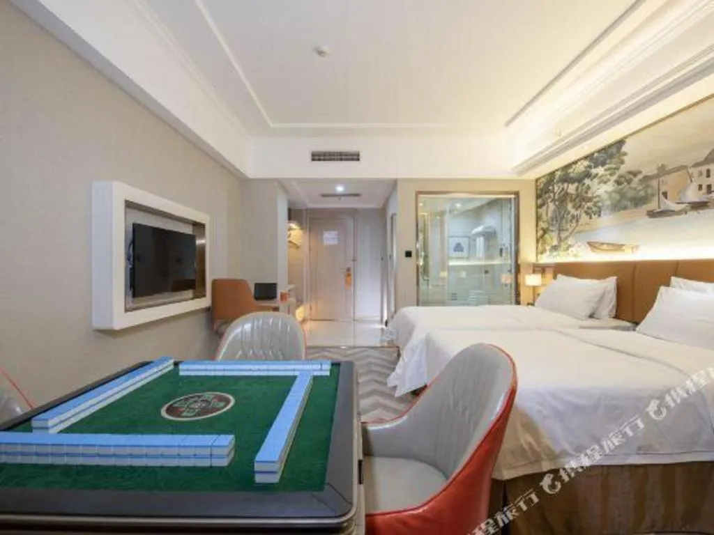 Bed in Vienna Hotel Tianjin Huaming