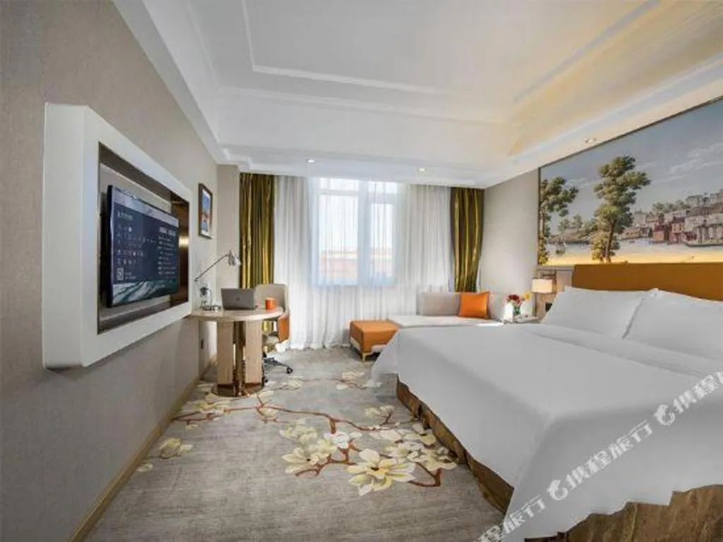 Bed in Vienna Hotel Tianjin Huaming