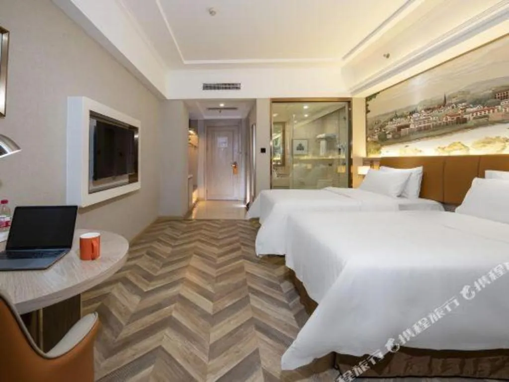 Bed in Vienna Hotel Tianjin Huaming