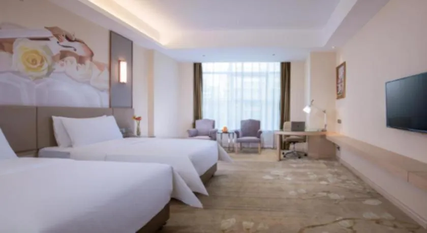 Bed in Vienna Hotel Tianjin Huaming