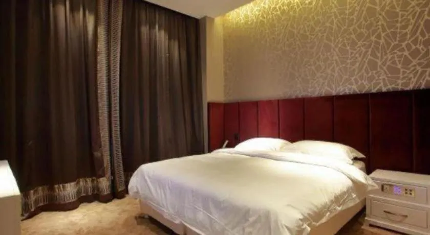 Bed in Harbin Ju Jian Hotel