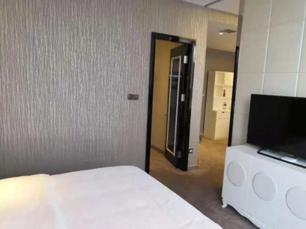 Bed in Harbin Ju Jian Hotel