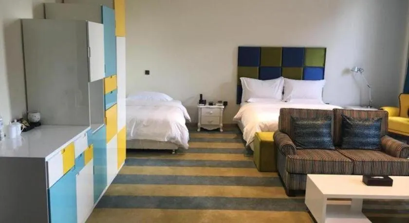 Bed in Harbin Ju Jian Hotel