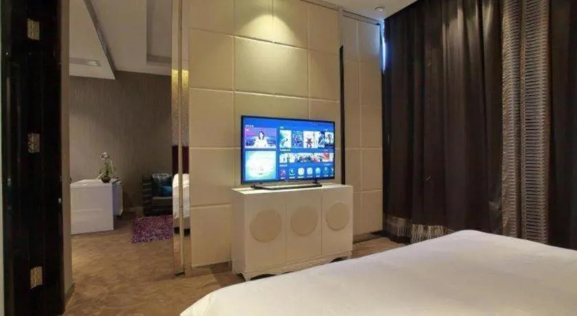 Bed in Harbin Ju Jian Hotel