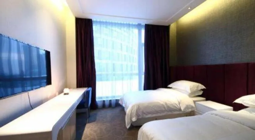 Bed in Harbin Ju Jian Hotel