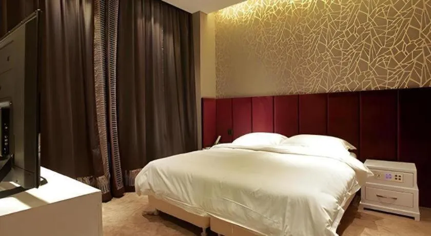 Bed in Harbin Ju Jian Hotel