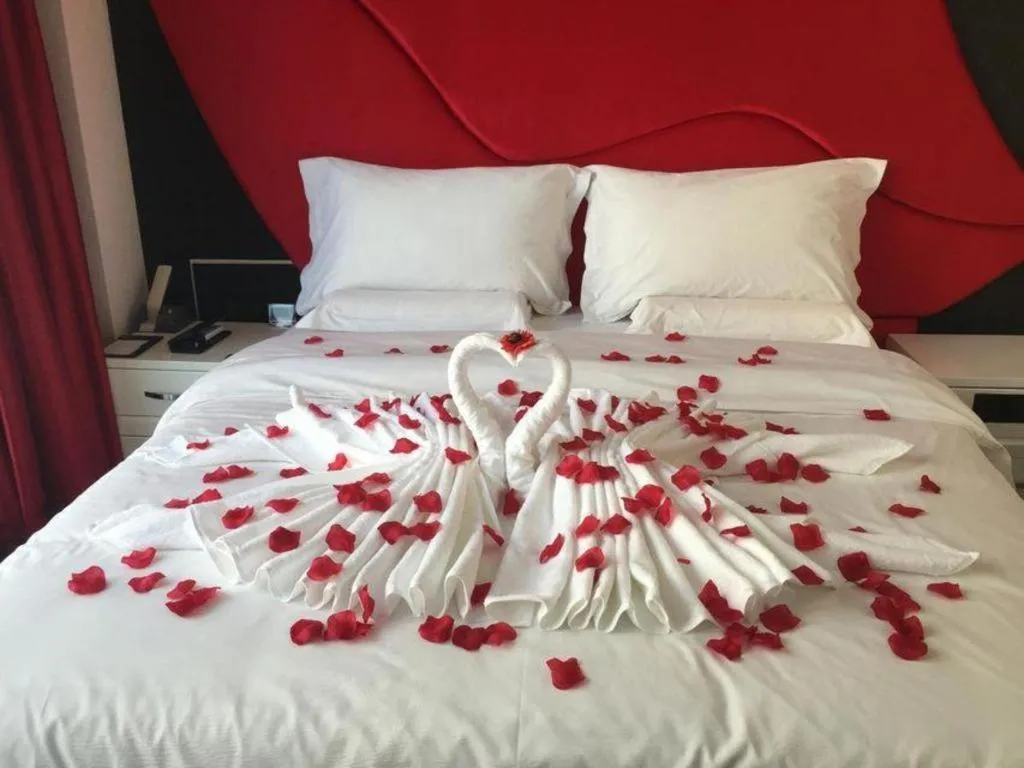 Bed in Harbin Ju Jian Hotel