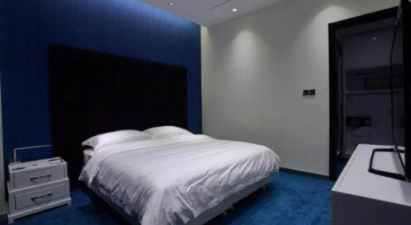 Bed in Harbin Ju Jian Hotel