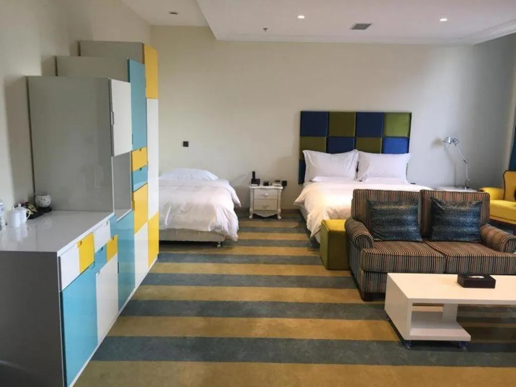 Bed in Harbin Ju Jian Hotel