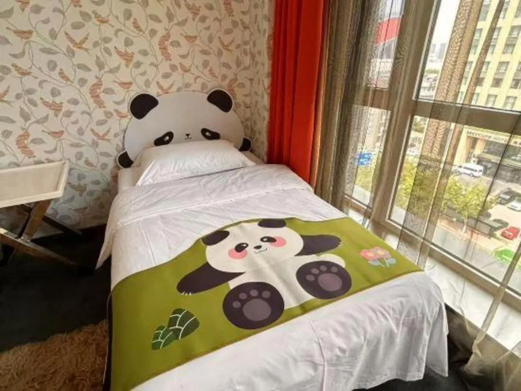 Bed in Harbin Ju Jian Hotel