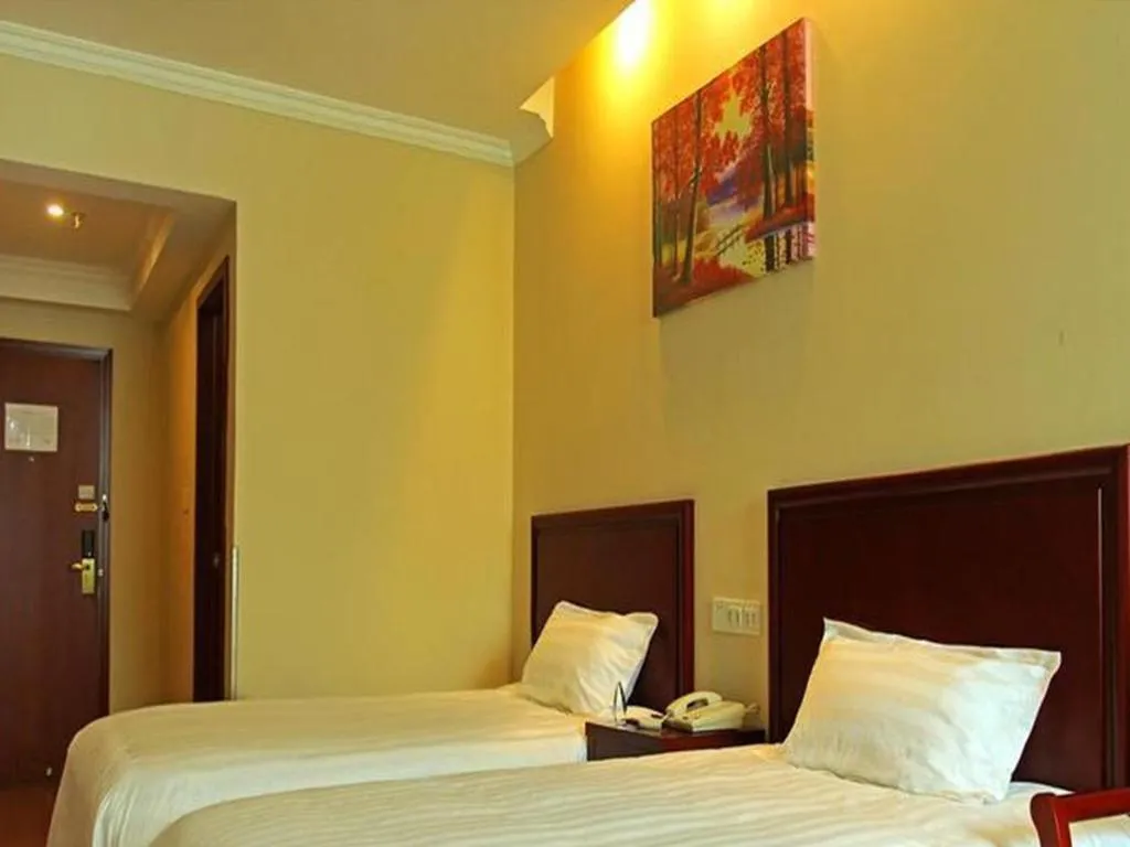 Bed in GreenTree Inn Beijing Daxing Xingye Street Liyuan Business Hotel
