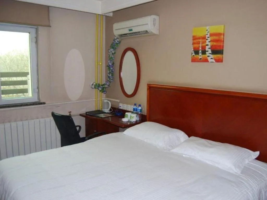 Bed in GreenTree Inn Beijing Daxing Xingye Street Liyuan Business Hotel