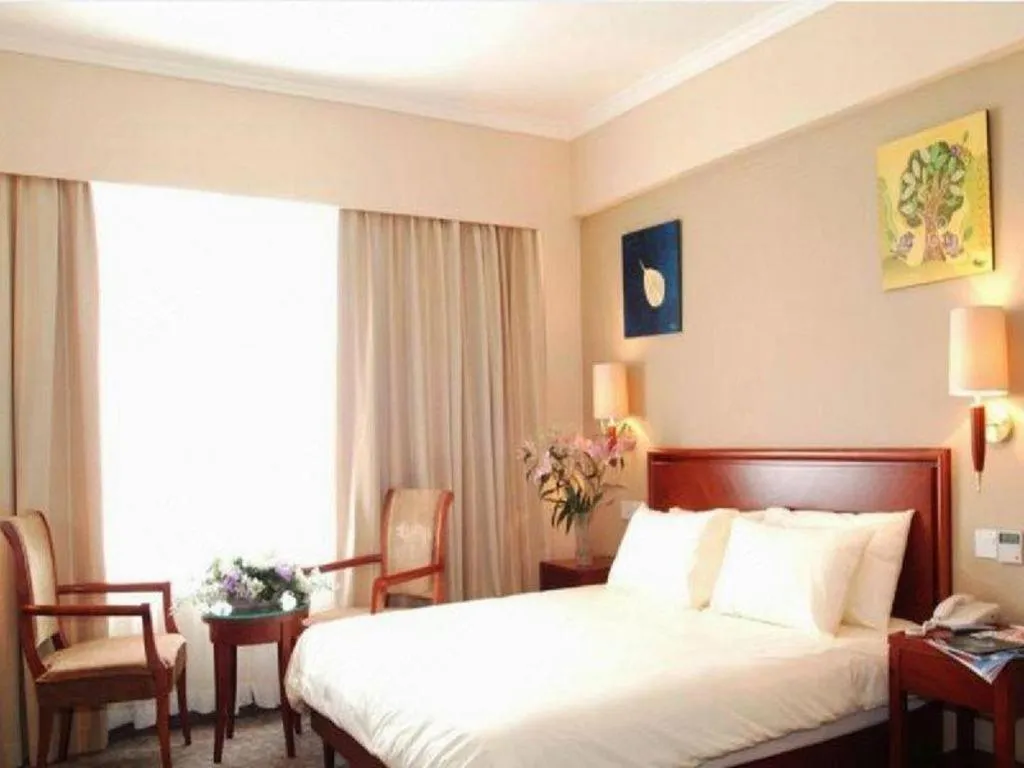 Bed in GreenTree Inn Beijing Daxing Xingye Street Liyuan Business Hotel