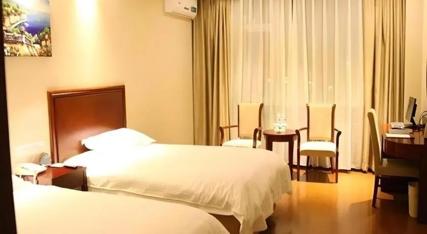 Bed in GreenTree Inn Beijing Daxing Xingye Street Liyuan Business Hotel