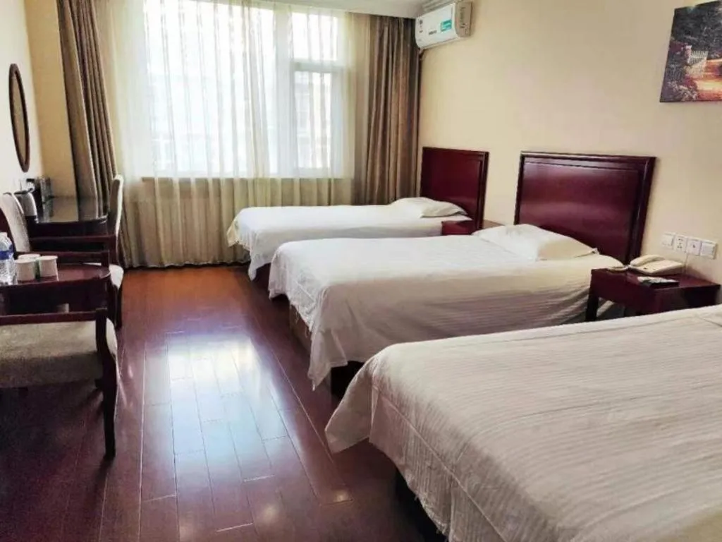 Bed in GreenTree Inn Beijing Daxing Xingye Street Liyuan Business Hotel