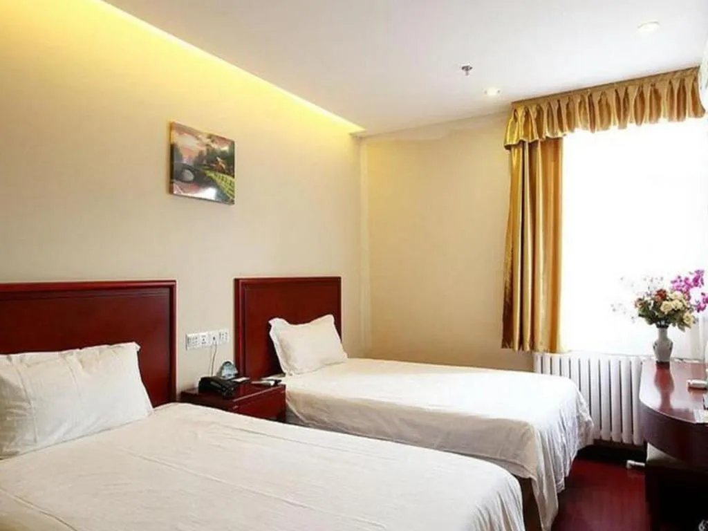 Bed in GreenTree Inn Beijing Daxing Xingye Street Liyuan Business Hotel