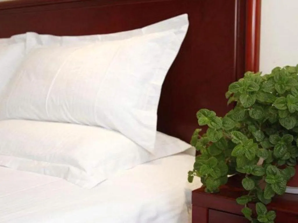 Bed in GreenTree Inn Beijing Daxing Xingye Street Liyuan Business Hotel