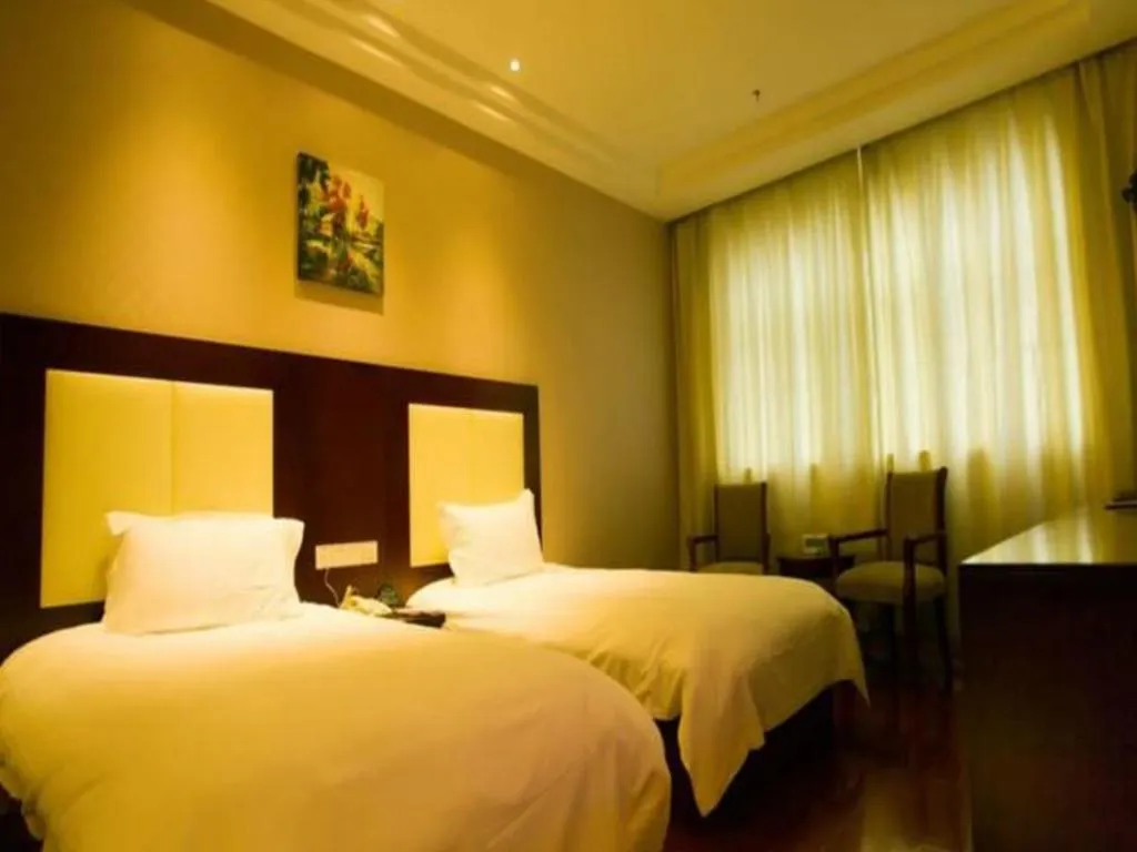 Bed in GreenTree Inn Beijing Daxing Xingye Street Liyuan Business Hotel