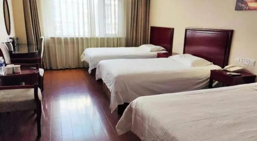 Bed in GreenTree Inn Beijing Daxing Xingye Street Liyuan Business Hotel