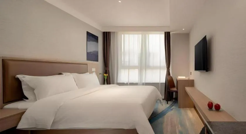 Bed in GreenTree Inn Ganzhou Sankang Temple DaRunFa Express Hotel